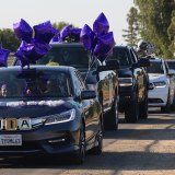 Decorated cars make their way though the Lemoore High School campus.